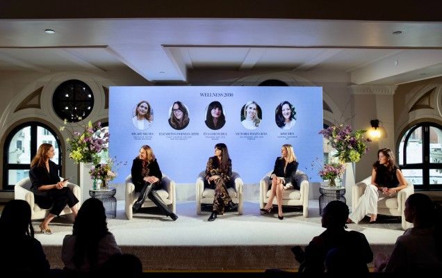 Panel conversation on stage at Vogue Business Future of Wellness